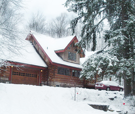 snow view of rental home in saranac lake, ny